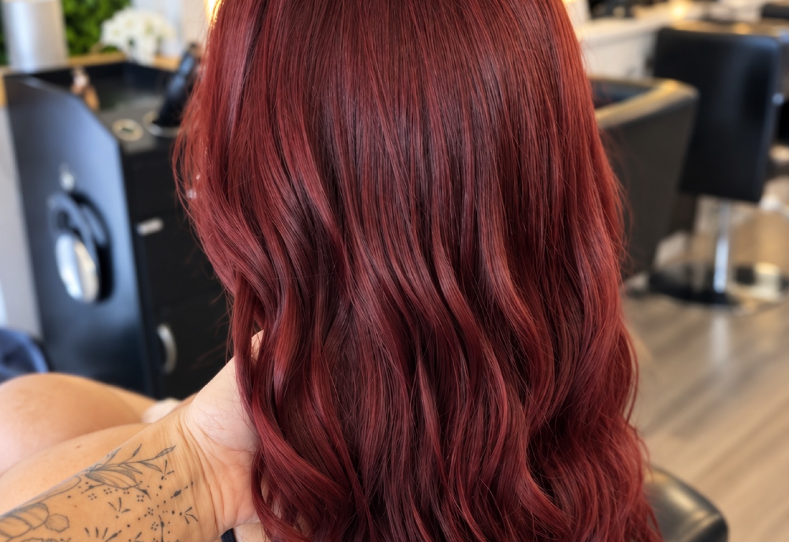 Deep cherry red, long and glossy